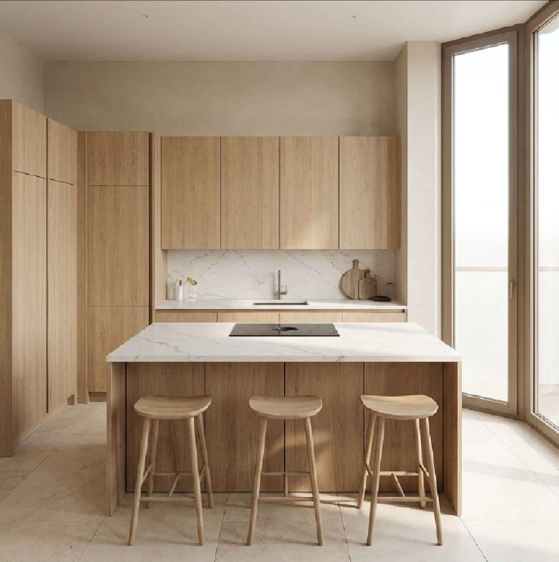 Kitchen: light stone island, oak fronts, wooden stools